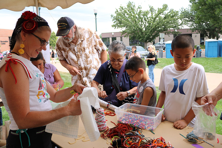 Photo of some kids enjoying a craft at the Kids' Creation Station