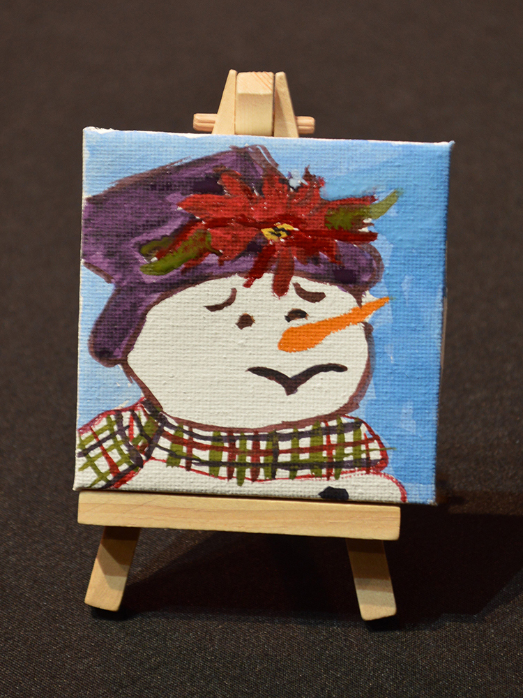 Photo of a snowman watercolor painting