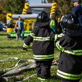 Photo of kids dressed in firefighter garb