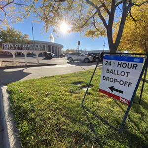 A sign outside Greeley City Hall that reads “24-Hour Ballot Drop-off. Vote!”