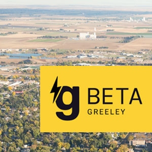 Aerial view of the City of Greeley with gBeta Greeley text overlay