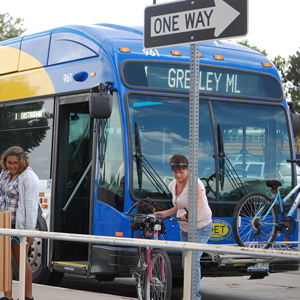 Residents getting off of a GET Transit bus at the Greeley Mall Transfer Center
